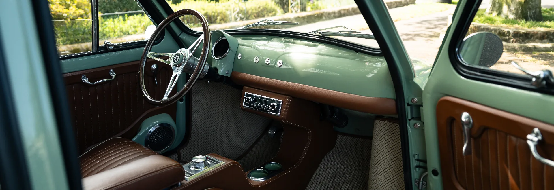Mint dashboard with cognac leather door card and chrome detailing